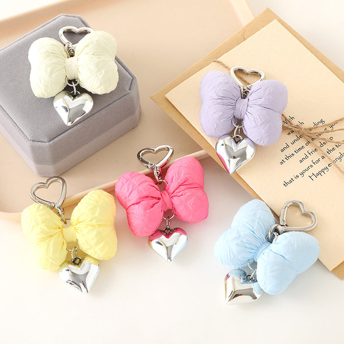 Wholesale Creative new cute bow pendant with high-end metal heart keychain decoration