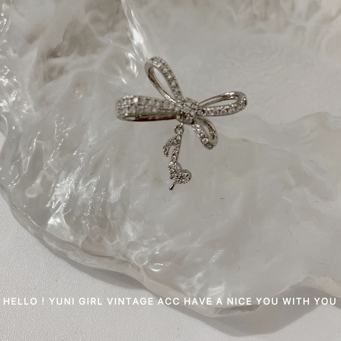 Wholesale Butterfly knot ear clip, musical note earrings, ear bone clip design, personalized earrings for women