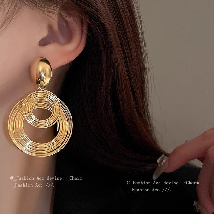 Wholesale Silver needle metal coiled round earrings niche fashion high-end