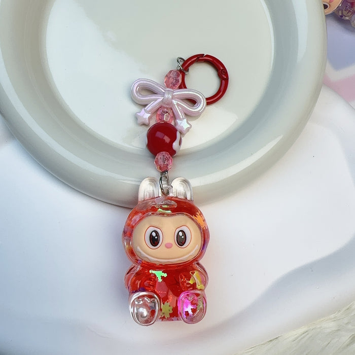 Wholesale Acrylic Cloth Quicksand Keychain Luminous Flash Cute Doll Bag Pendant Gift Keychain