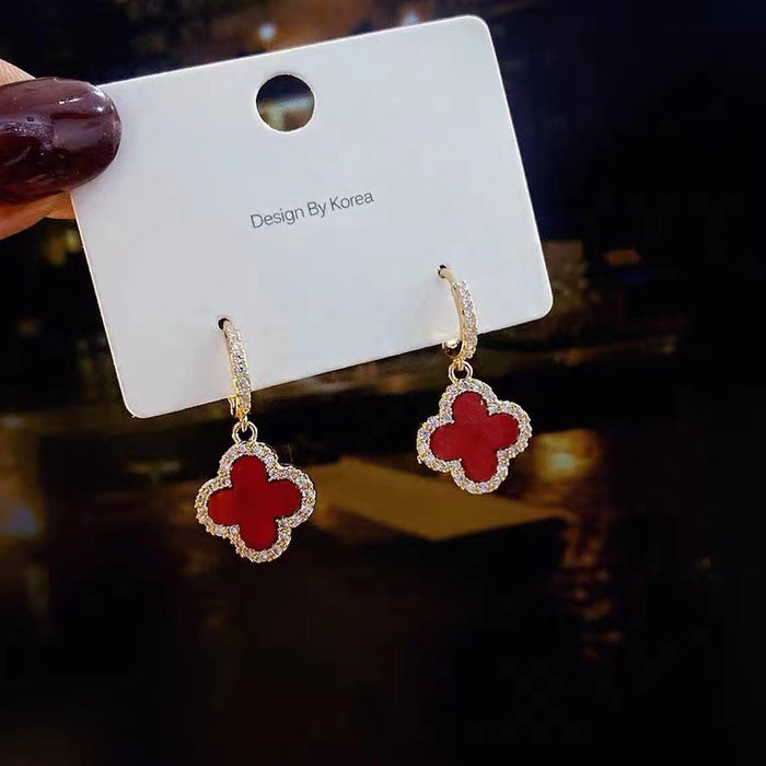 Wholesale Four leaf clover earrings, women's high-end classic earrings, copper gold-plated light luxury sparkling diamond zircon earrings