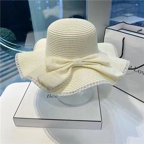 Wholesale Bow hat, large brimmed straw hat, sun hat, fashionable sun hat