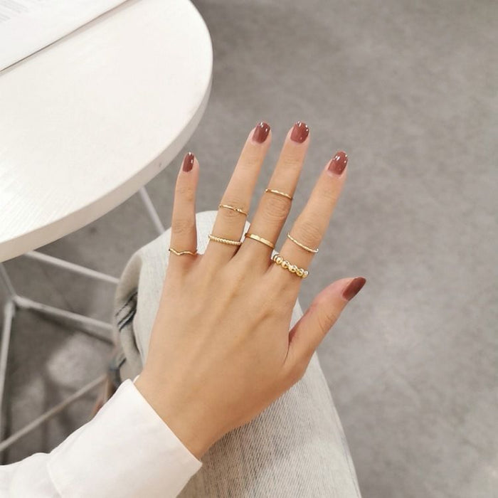 Wholesale Set of simple and personalized 8-piece ring with a plain circle and stacked rings