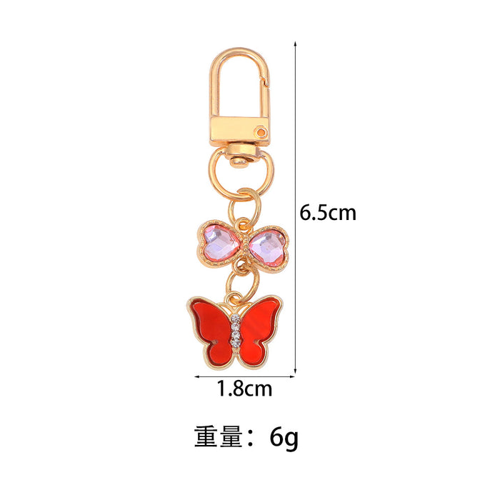 Wholesale Keychain Pendant Creative Alloy Butterfly Headphone Mobile Phone Bag Pendant