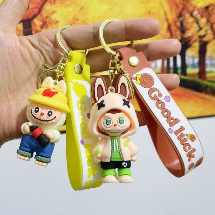 Wholesale Cute cartoon trendy schoolbag pendant keychain furry cute little monster