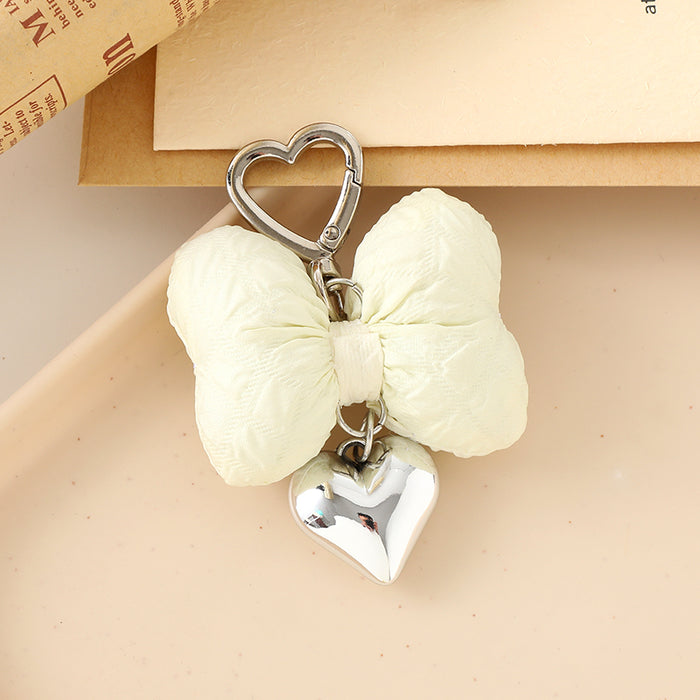 Wholesale Creative new cute bow pendant with high-end metal heart keychain decoration