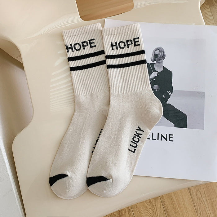 Wholesale Spring and Autumn Black and White High Elastic Alphabet Sports Middle Tube Women's Socks
