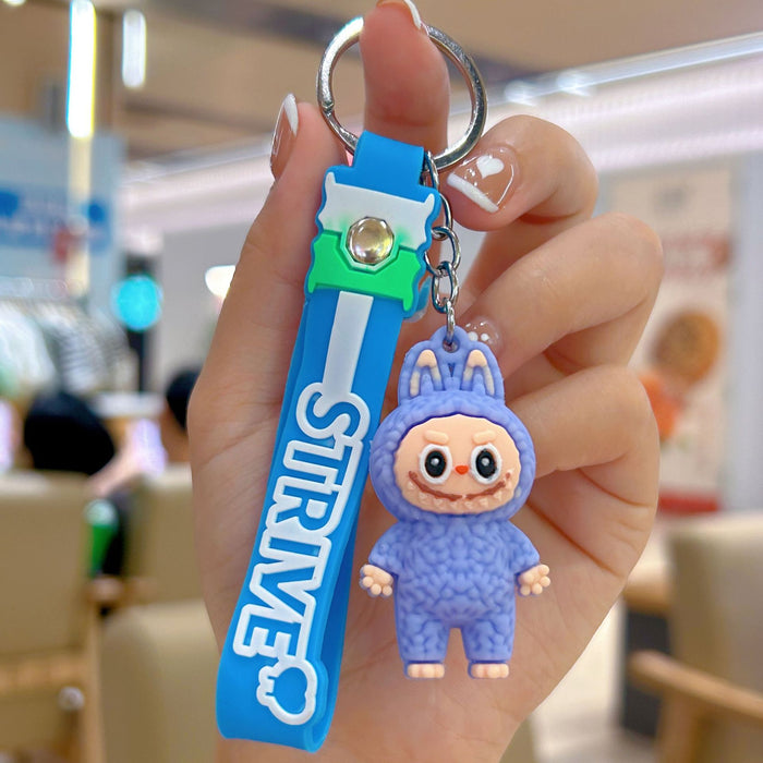 Wholesale Cute cartoon silicone keychain with cute little monster keychain for sweatshirt