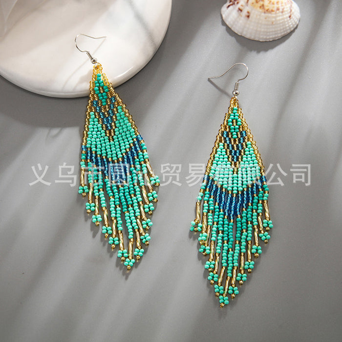 Wholesale color Bohemian rice bead earrings women' s minority ethnic hand-woven long tassel earrings
