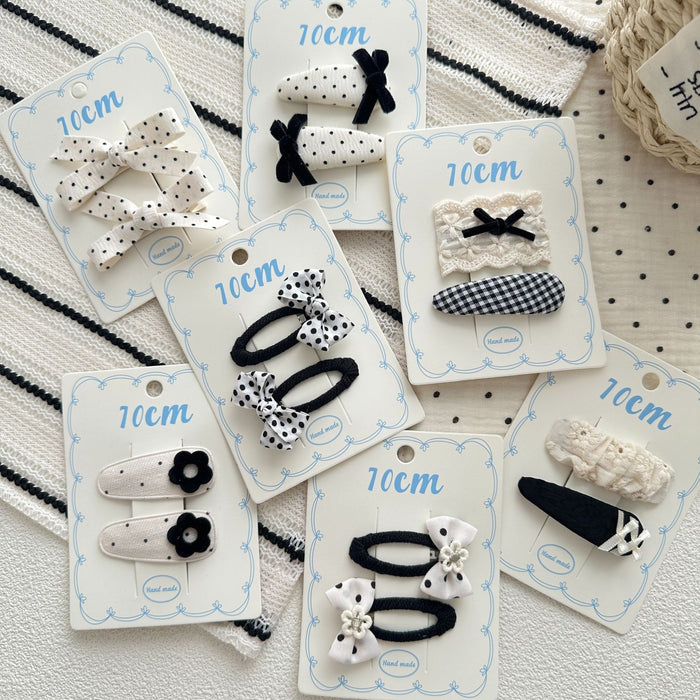 Wholesale Sweet bow hair clip with water droplets, wavy dots, children's fabric, side broken hair, wavy dots, bangs clip