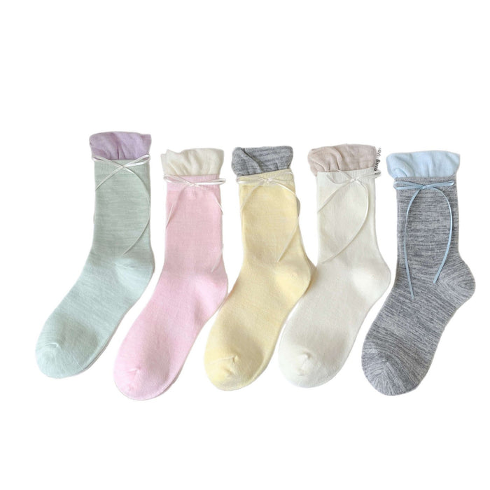 Wholesale Butterfly knot pile socks, cute and versatile pile socks
