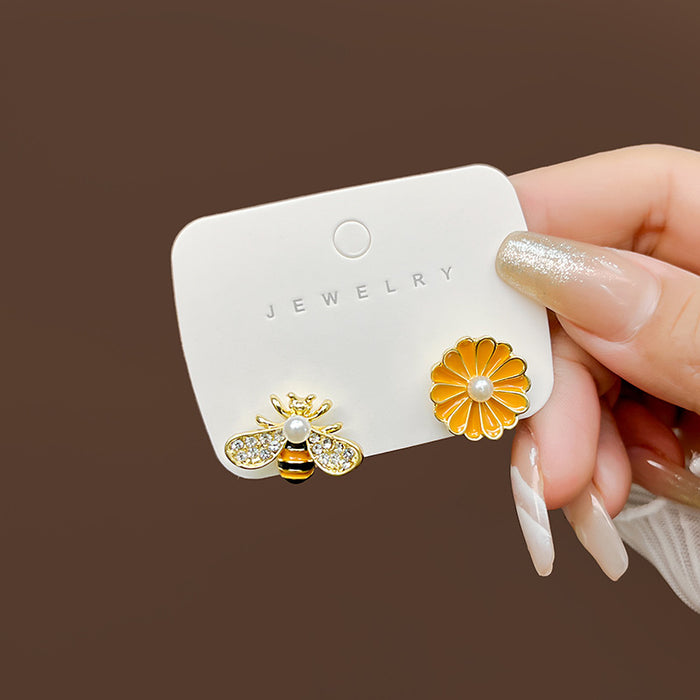 Wholesale Silver Needle Asymmetric Dripping Oil Flower Earrings Cartoon Exquisite and Compact Earrings