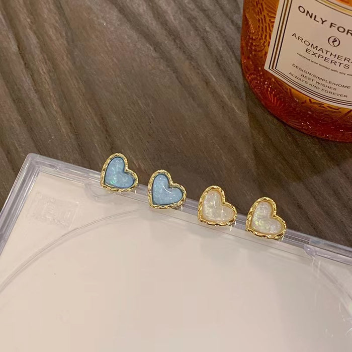 Wholesale Elegant Small White Cat Eye Heart Earrings S925 Silver Needle Earrings