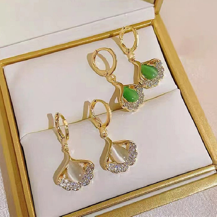 Wholesale Personalized cat eye stone ginkgo leaf earrings with niche design, high-end and trendy ear loops and accessories