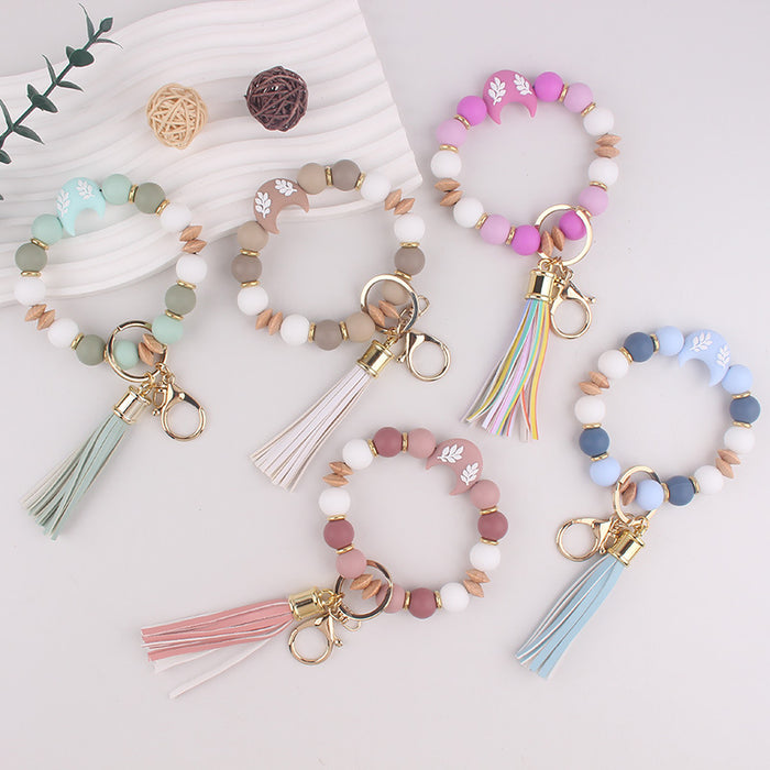 Wholesale Silicone moon beads bag key bracelet bracelet silicone beads beech wood beads tassel keychain