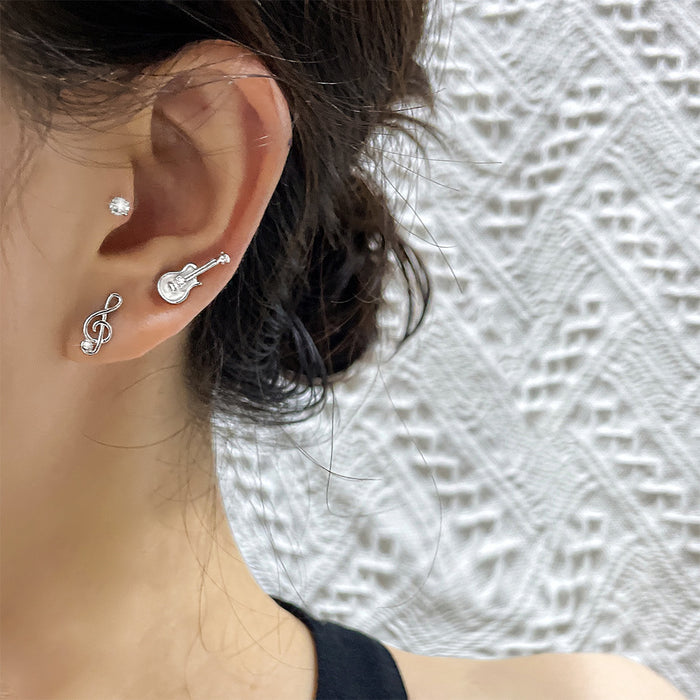 Wholesale Creative Cute Note Earrings Black Compact Single Diamond Asymmetric Violin Instrument Earrings