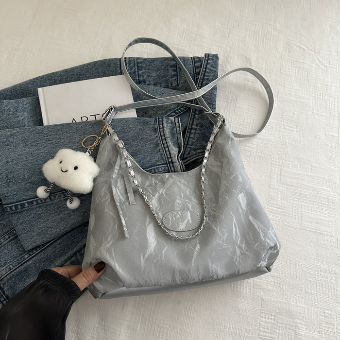 Wholesale Personalized commuting shoulder bag, fashionable large capacity tote bag, casual