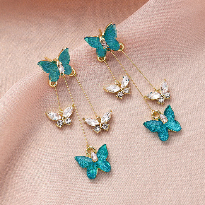 Wholesale Silver needle purple butterfly tassel earrings with a light luxury and high-end feel, sparkling diamond long earrings, retro temperament earrings