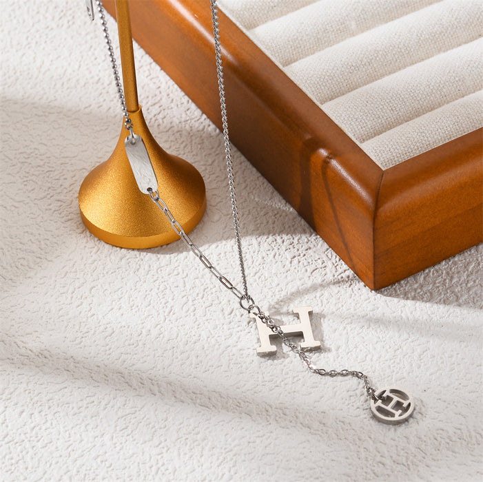 Wholesale Electroplated design with tassel letters, tassel titanium steel necklace, minimalist collarbone chain