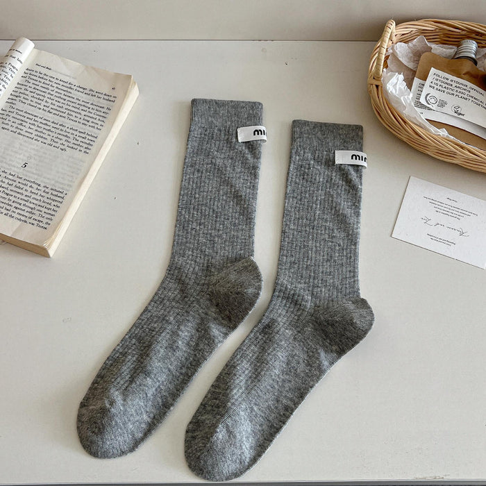 Wholesale Medium length socks with solid color letters, fabric labels, stacked socks, thin cotton socks, sweat absorbing and breathable