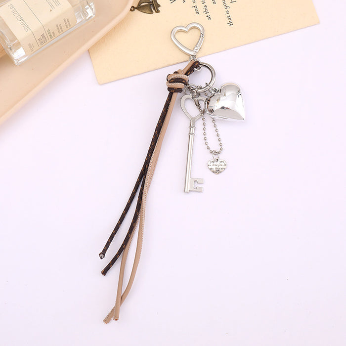 Wholesale Leather bow heart pendant luggage keychain lanyard accessories single buckle tassel pendant accessories