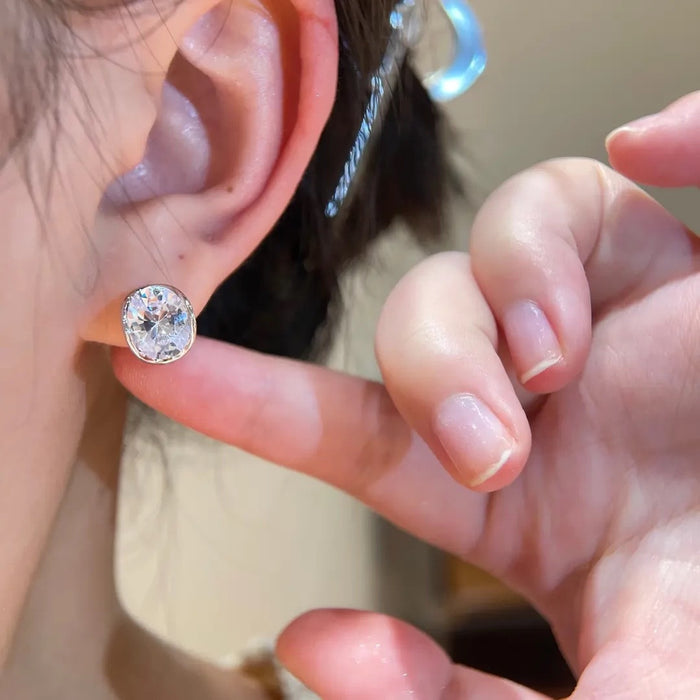 Wholesale Temperament earrings, irregular circle design, high-end texture