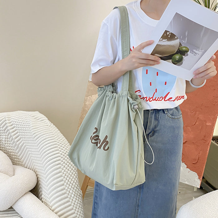 Wholesale Artistic lazy canvas bag, casual versatile shoulder bag, large capacity tote bag