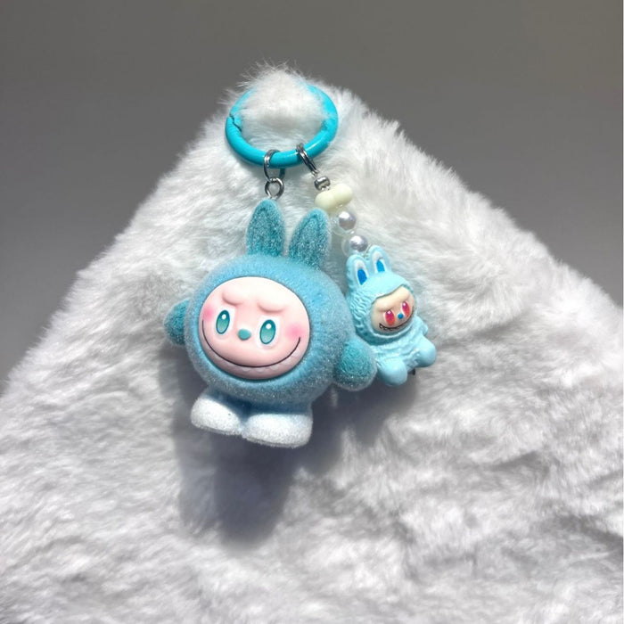 Wholesale Flocked egg boy pull cloth high value cute mini doll ornaments pendant three-dimensional resin accessories