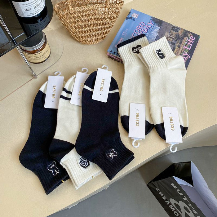 Wholesale Embroidered socks and socks
