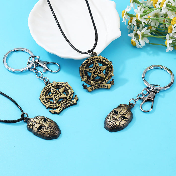 Wholesale Zinc alloy Kazi stone demon face necklace and pentagram keychain
