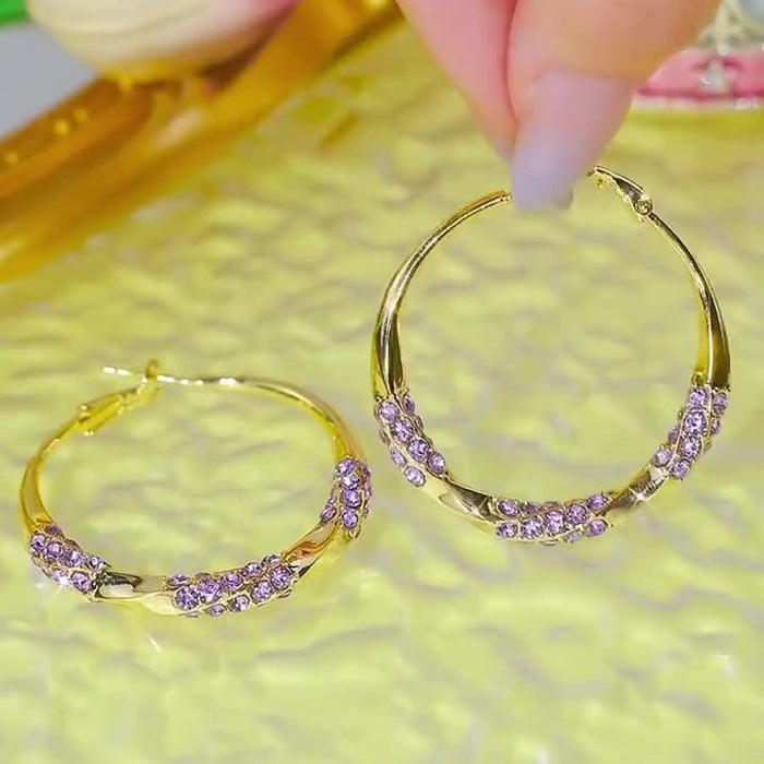 Wholesale Diamond studded twisted circle earrings for women with exaggerated design, unique personality, and retro style earrings