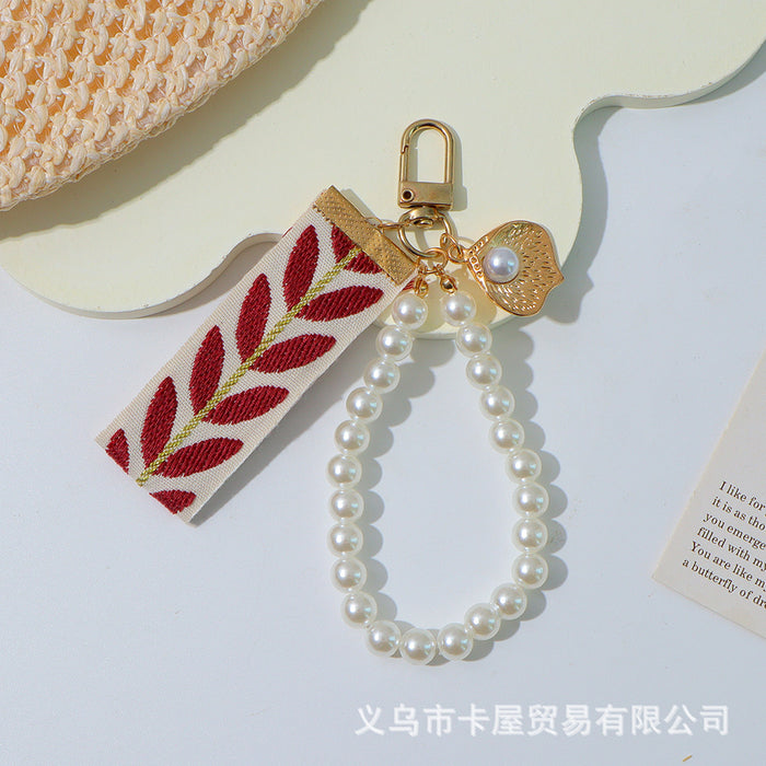 Wholesale Ribbon car alloy keychain pendant creative leaf striped pearl accessory bag decoration