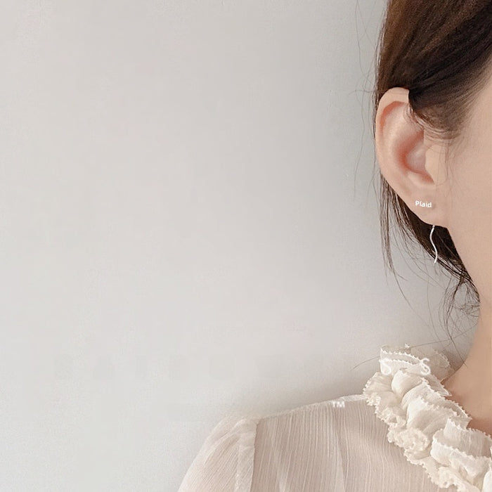 Wholesale Pure silver wave like light luxury flower earrings, compact in size