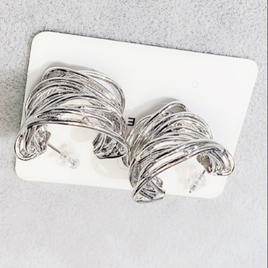 Wholesale Vintage-style wire-wrapped C-shaped hoop earrings in 18K gold.