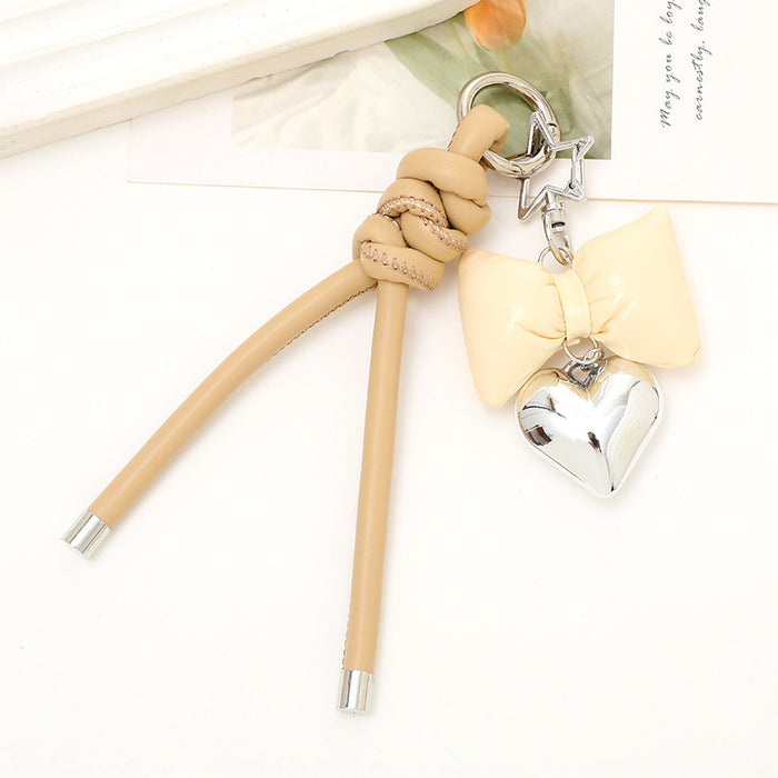 Wholesale Leather bow heart pendant luggage keychain lanyard accessories single buckle tassel pendant accessories