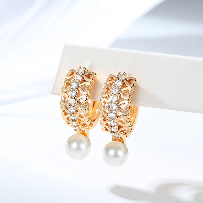 Wholesale Copper gold-plated retro light luxury simple pearl earrings, small and fashionable design, inlaid with zircon ear buckles, wholesale of ear accessories