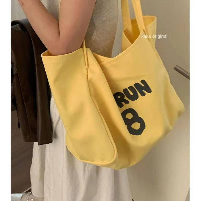 Wholesale Canvas bag commuting shoulder bag versatile tote bag large capacity outdoor tote bag
