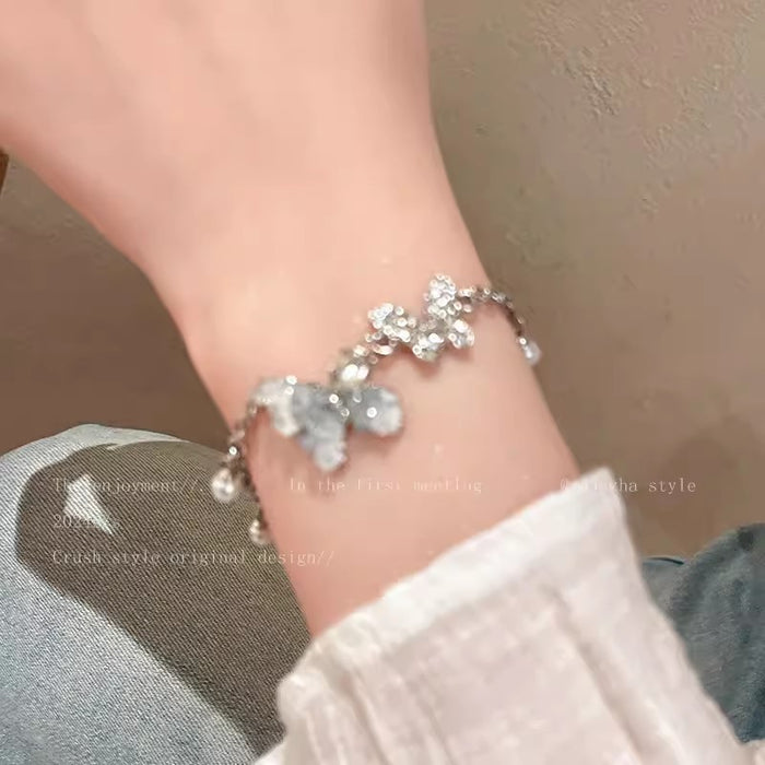 Wholesale Gradient blue crushed stone butterfly bracelet, niche design temperament, handmade pearl butterfly bracelet