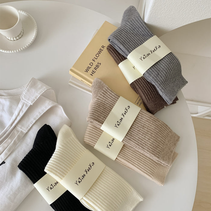 Wholesale Woolen socks in autumn and winter, solid color, vertical stripes, woolen midsole socks, thick and warm, stacked long socks
