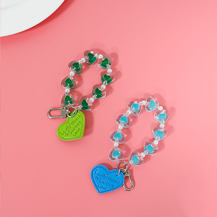 Wholesale fresh simple color love hand chain transparent acrylic chain mobile case accessories