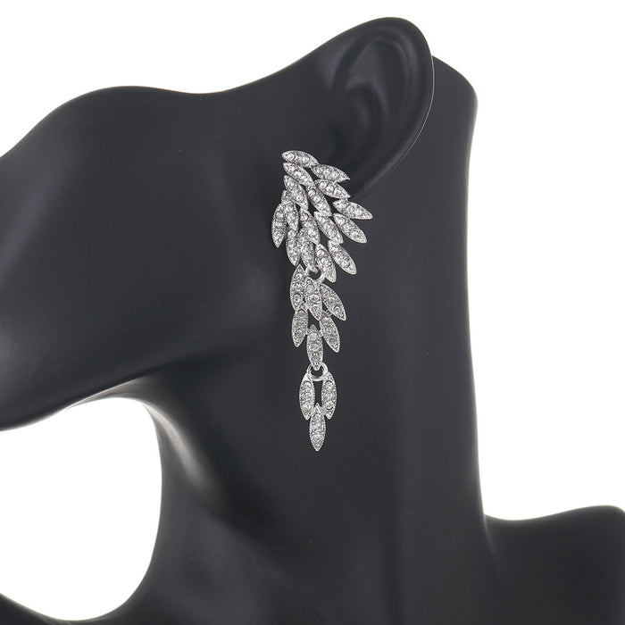 Wholesale Exaggerated earrings with fashionable tassels, long alloy and diamond studded earrings, crystal wing earrings
