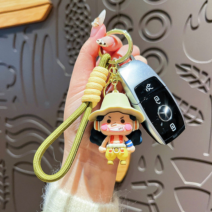 Wholesale Creative keychain, cute cartoon doll pendant, doll machine, small gift