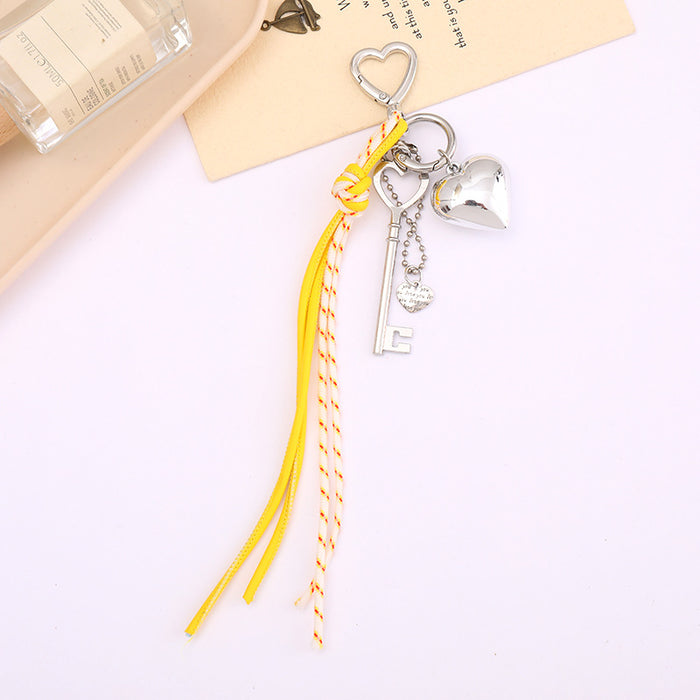 Wholesale Leather bow heart pendant luggage keychain lanyard accessories single buckle tassel pendant accessories