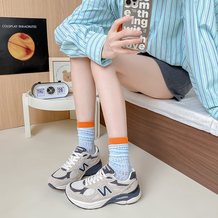 Wholesale Thin mesh breathable mid tube socks with trendy contrasting colors, long tube pile socks