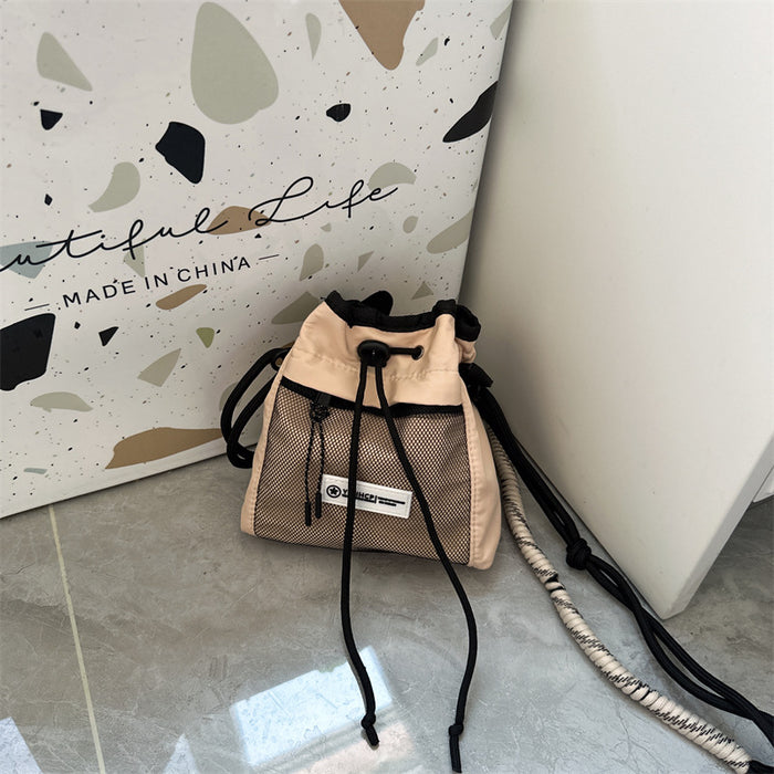 Wholesale Children's bag, outdoor sports crossbody bag, letter drawstring bucket bag, lightweight shoulder bag