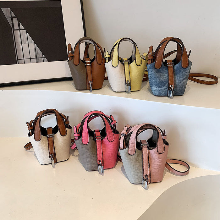 Wholesale Children's bag, high-end color blocked mini bucket bag, hand-held bucket bag, crossbody bag