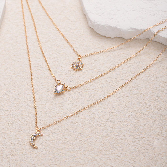 Wholesale Popular retro multi-layer layered star moon necklace with light luxury design and diamond studded water droplet pendant