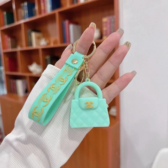 Wholesale Cartoon keychain silicone mini bag pendant car keychain fashion gift