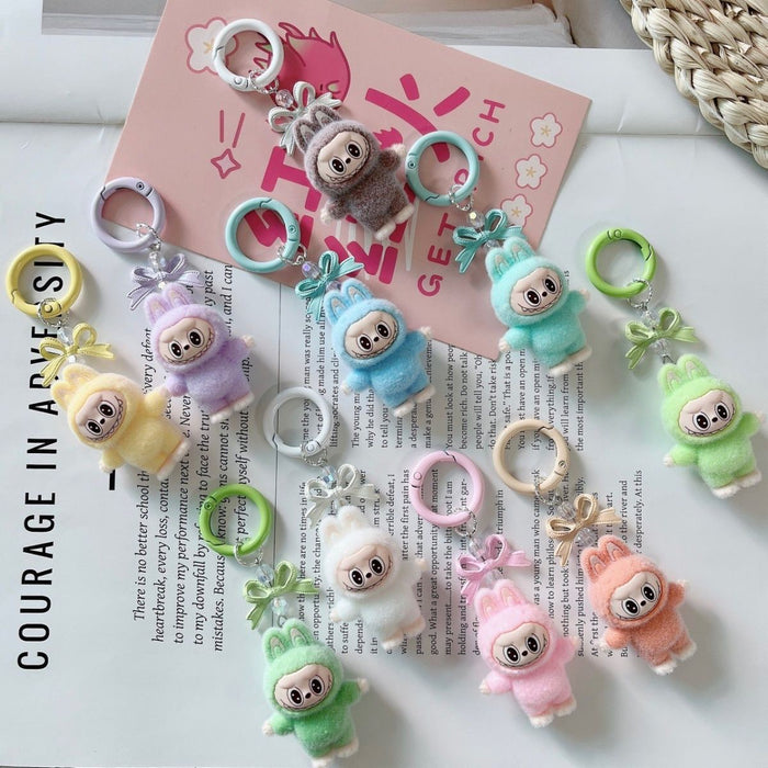 Wholesale 10pcs Cartoon cute bow little monster keychain plush doll pendant student bag hanging ornament gift