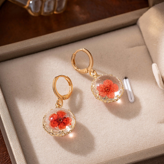 Wholesale Transparent circular glass ball earrings, irregular eternal flower earrings, flower beach accessories in style
